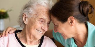 Dementia and Occupational Therapy - Home caregiver and senior adult woman