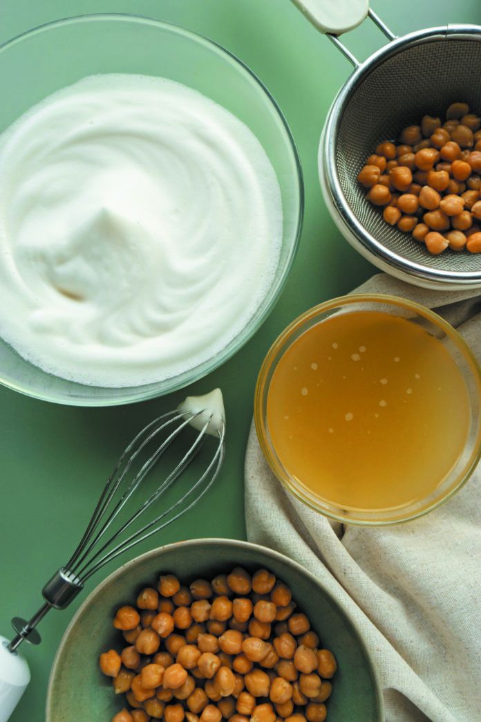 image of bowls with chickpeas , chickpea's liquid water brine and whipped aquafaba , egg replacer in cooking