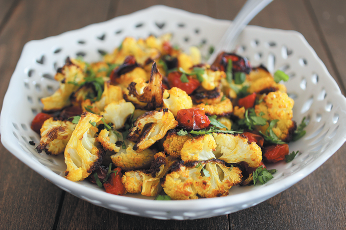 TURMERIC ROASTED CAULIFLOWER WITH TOMATOES